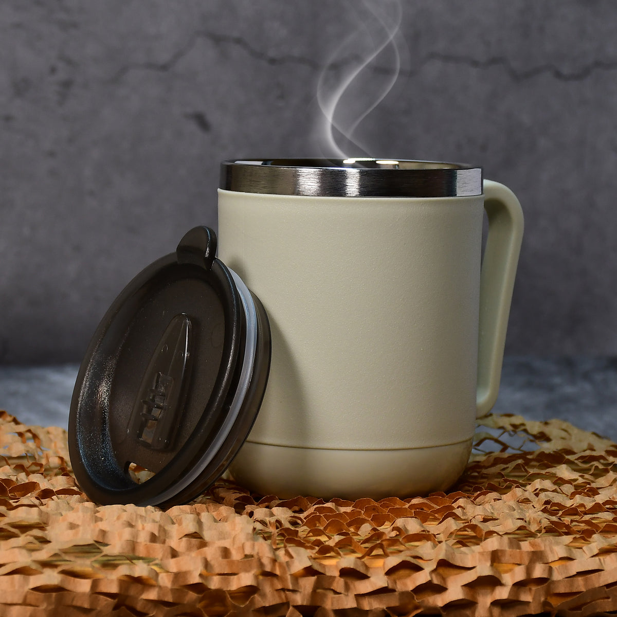 Ganesh Premium Stainless Steel Coffee Mug With Heat Resistant Mug Lid. Approx 400ml Mug.