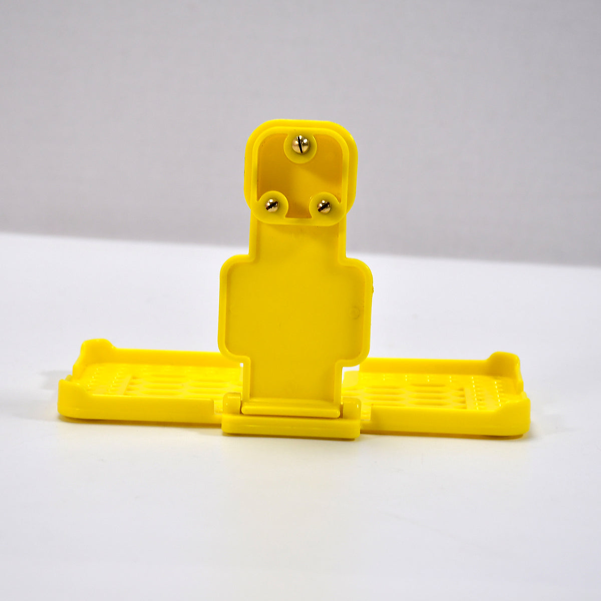 Multi-purpose Wall Holder Stand For Charging Mobile Just Fit In Socket And Hang (Yellow)